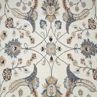 Hand-knotted wool rug featuring intricate allover floral and paisley motifs in ivory, blue, tan, 9x12 living-room size