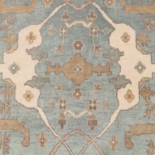 Hand-knotted wool rug featuring open Oushak pattern in blue, cream, beige tones, 8x10 area rug.