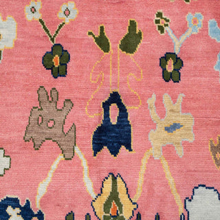 Hand-knotted wool rug featuring oversized Oushak flowers and vines in coral, blue, green and yellow, 9x12 ft.