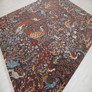 Hand-knotted wool rug featuring peacocks, birds and flowering trees in dark brown, blue and gold, 8x10 ft.