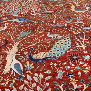 Hand-knotted wool rug featuring peacocks, cranes, and floral garden pattern in rust, blue, ivory, 9x12