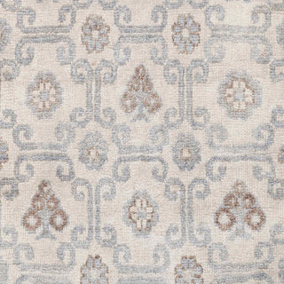 Hand-knotted wool rug featuring small floral lattice pattern in cream, grey, brown, 6x9 size.
