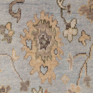 Hand-knotted wool rug featuring soft Oushak floral pattern in blue, ivory, rust, beige, 8x10.