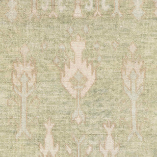 Hand-knotted wool rug featuring subtle tree-of-life and floral pattern in muted green, beige, 9x12 size