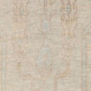 Hand-knotted wool rug featuring tone-on-tone tree-of-life and floral pattern in cream, sand, blue, 8x10