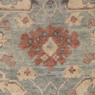 Hand-knotted wool rug featuring traditional Oushak floral pattern in green, beige, terracotta, 8x10 size