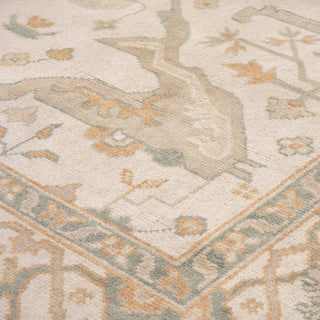 Hand-knotted wool rug featuring traditional Oushak floral pattern in ivory, green, beige, 8x10