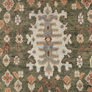 Hand-knotted wool rug featuring traditional Oushak motifs in olive, rust, taupe, ivory, 8x10 size.