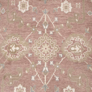 Hand-knotted wool rug featuring traditional Oushak palmette and vine pattern in rose, cream, green, 9x12