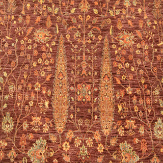 Hand-knotted wool rug featuring tree-of-life and floral vines in brown, orange and green, 8x10 ft size.