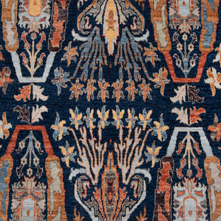 Hand-knotted wool rug featuring tree of life motifs in navy teal rust ivory, 5x8 ft.