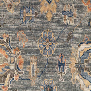 Hand-knotted wool rug featuring tribal Oushak motifs in grey, rust, gold, blue, 9x12 area rug