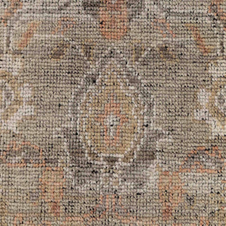 Hand-knotted wool rug featuring vintage-look oriental pattern in slate gray, terracotta, gold, 8x10.
