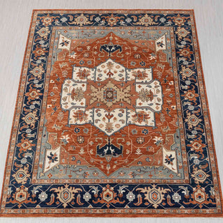 Hand-knotted wool rug in rust, ivory, navy with bold geometric medallion design, 12x15.