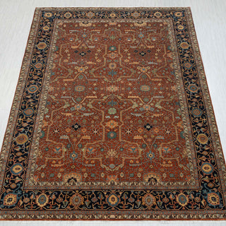 Hand-knotted wool rug in rust, teal, navy with geometric Heriz Serapi pattern, 5x8