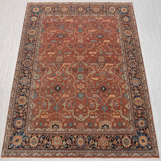 Hand-knotted wool rug in rust, teal, navy with geometric Heriz Serapi pattern, 5x8