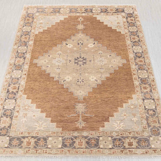 Hand-knotted wool rug in warm brown, beige with large geometric medallion design, 10x14