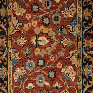 Hand-knotted wool runner featuring allover floral vines in rust field with navy border, long 2.6x14 ft hallway size.