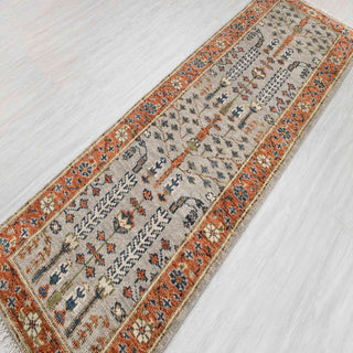 Hand-knotted wool runner rug featuring tree motifs in beige rust orange navy blue, 2.6x8 ft. Durable Kazak style