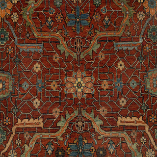 Hand-knotted wool rug featuring dense tribal geometric design on rust field with navy border 10x14 