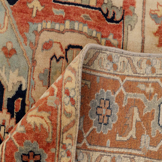 Heriz/Serapi style hand-knotted rug with tribal medallion motif in ivory field and rust border, room-size 5x8 area