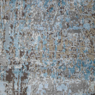 Indian style hand-knotted rug with abstract faded motif in blue-grey tones. 8x10 ft size, fringed edges, contemporary distressed rug
