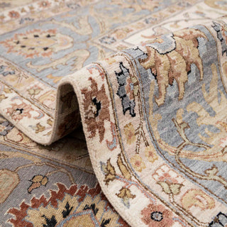 Indo-Persian style hand-knotted rug with botanical motifs in ivory, sky blue, gold, and taupe, grand 10x14 area