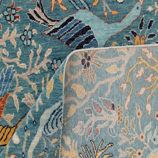 Kashmiri-style hand-knotted rug with birds-of-paradise garden motifs in teal, coral, cream, navy, 9x12