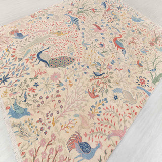 Kashmiri-style hand-knotted rug with tree-of-life bird motifs in cream, teal, rose, gold tones, 8x10
