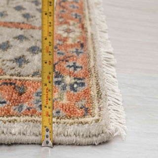 Kazak hand-knotted wool rug in gray beige orange blue with floral tree design. Ideal 2.6x15 ft runner size