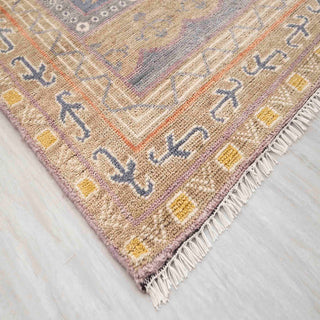 Large 9x12 living room rug, soft low-pile wool, pastel geometric design, elegant modern statement carpet.