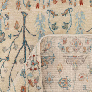 Large wool area rug, ivory and blue floral garden design, durable low-pile 9x12 carpet ideal for bright living rooms.