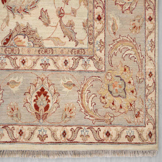 Modern classic hand-knotted rug with elegant curvilinear floral pattern in ivory and muted pastels.