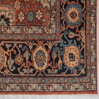 Modern classic hand-knotted wool rug with bold angular lattice pattern in rust and navy tones, 9x12