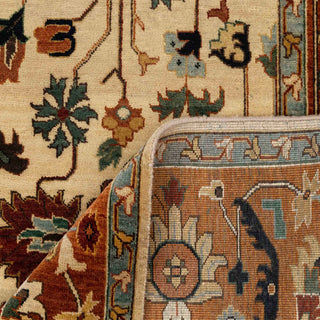 Modern classic hand-knotted wool rug with curvilinear floral pattern in ivory and rust tones