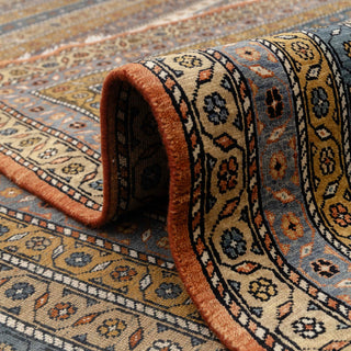 Modern hand-knotted ivory wool rug with linear geometric pattern and dark accents, 8x10 living room