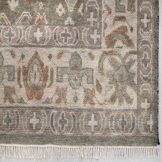 Modern hand-knotted rug with abstract Oushak-inspired pattern in warm gray, beige, subtle green.

