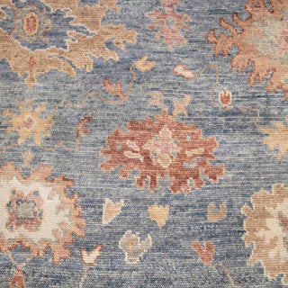 Modern hand-knotted rug with abstract Oushak pattern in blue, rust, beige accents, 9x12.