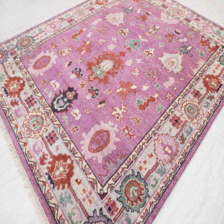 Modern hand-knotted rug with abstract Oushak pattern in lavender, peach, and green accents, 8x10.
