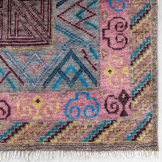 Modern hand-knotted rug with abstract colorful Oushak pattern and zigzag border in brown, blue, pink, ideal living room.
