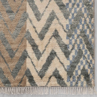 Modern hand-knotted rug with abstract linear chevron stripes in beige, tan, blue, ideal living room.