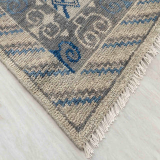 Modern hand-knotted rug with abstract tribal Oushak pattern in ivory, denim blue, taupe, ideal living room.