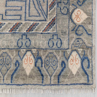 Modern hand-knotted rug with abstract tribal pattern in muted grey, blue, rust, perfect large 9x12 living room.