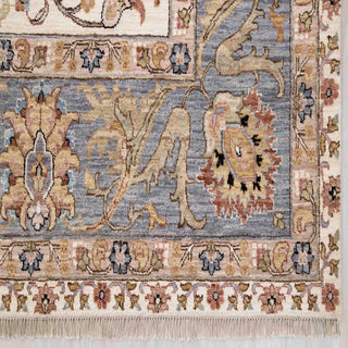 Modern hand-knotted rug with airy ivory background and pastel blue floral vines, durable wool 10x14 living room carpet.