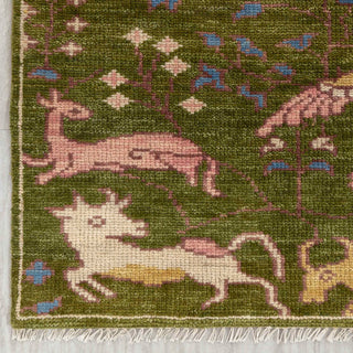 Modern hand-knotted rug with detailed animal and bird pattern in green, blue, blush; ideal living room
