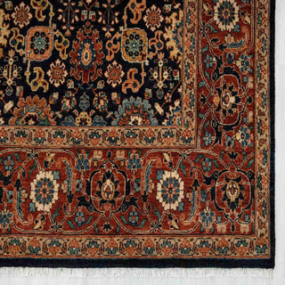 Modern hand-knotted rug with detailed floral pattern in navy, terracotta, and beige, durable 8x10 for high-traffic use