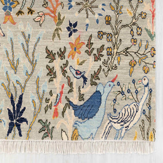 Modern hand-knotted rug with detailed wildlife pattern in stone-grey, blue, gold accents, 6x9