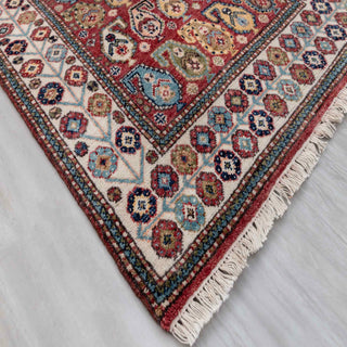 Modern hand-knotted rug with geometric paisley pattern in red, ivory, teal tones, 3x5.