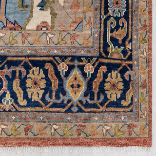 Modern hand-knotted rug with geometric pattern in rust, navy, sky blue and beige, perfect for living rooms