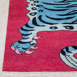 Modern hand-knotted rug with graphic tiger pattern in blue and pink tones, 5x7 ft area